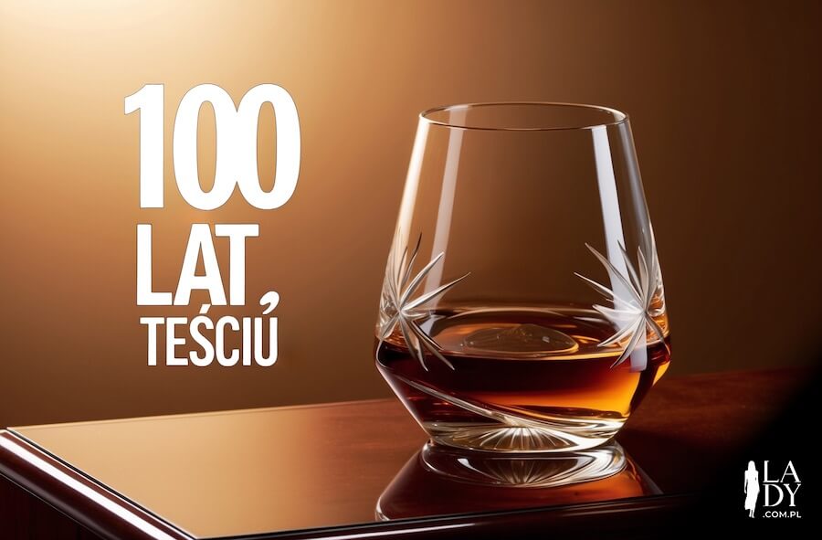 Szklanka whisky na stole i napis: 100 lat teściu